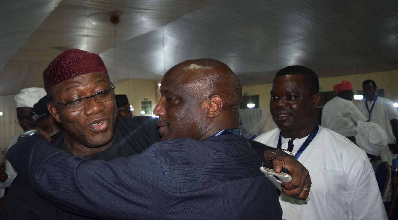 Winner of the All Progressives Congress (APC) Ekiti State Governorship primary, Dr Kayode Fayemi, in a warm embrace with one of the co-contestants, Senator Gbenga Aluko; with them is Captain Adebomi, also an aspirant, shortly after Fayemi was declared winner in Ado-Ekiti…on Sunday.