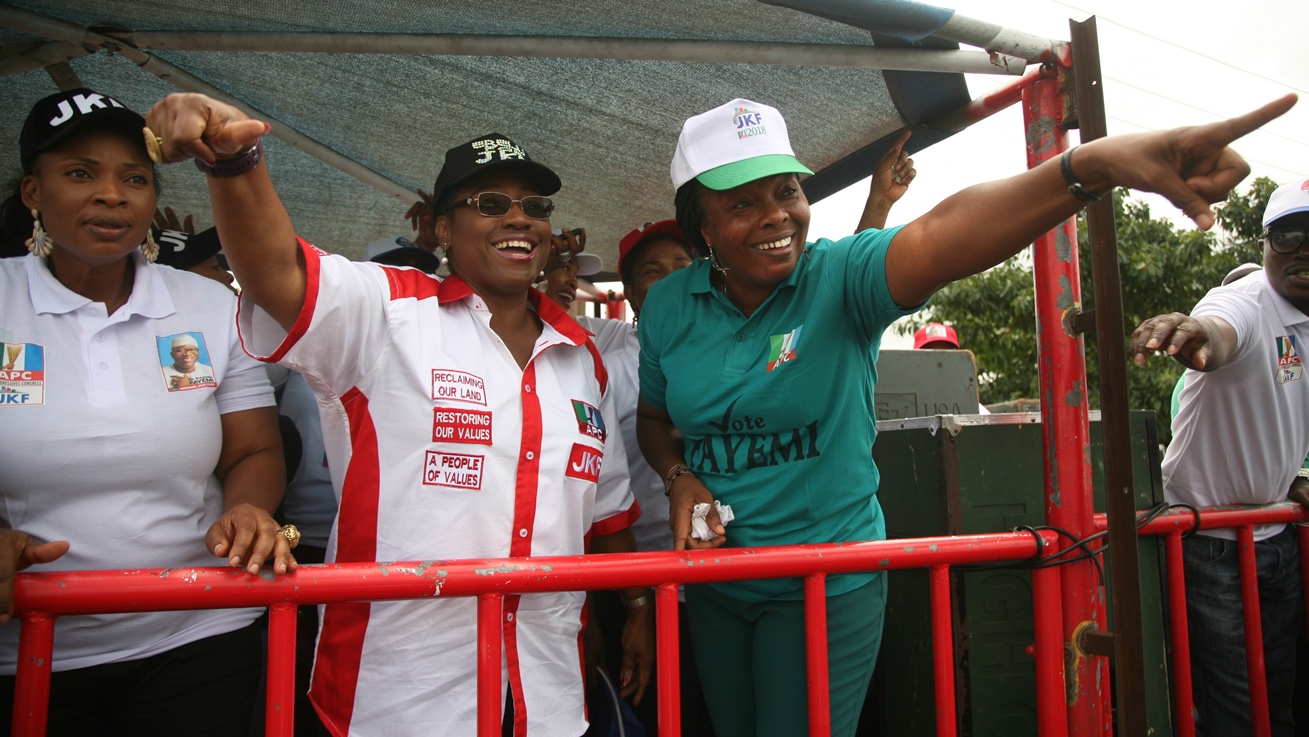 L-R: Deputy State Chairman, All Progressives Congress (APC), Mrs Kemi Olayeye; Wife of APC Governorship Candidate, Erelu Bisi Fayemi; and former Chief Whip, Ekiti State House of Assembly, Hon Wunmi Ogunlola, during the APC Women Road Show in support of Dr Kayode Fayemi in Ekiti West Local Government Area